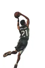 Joueur de basketball en train de marquer un panier